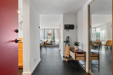 a kitchen with a sink and a stove top oven