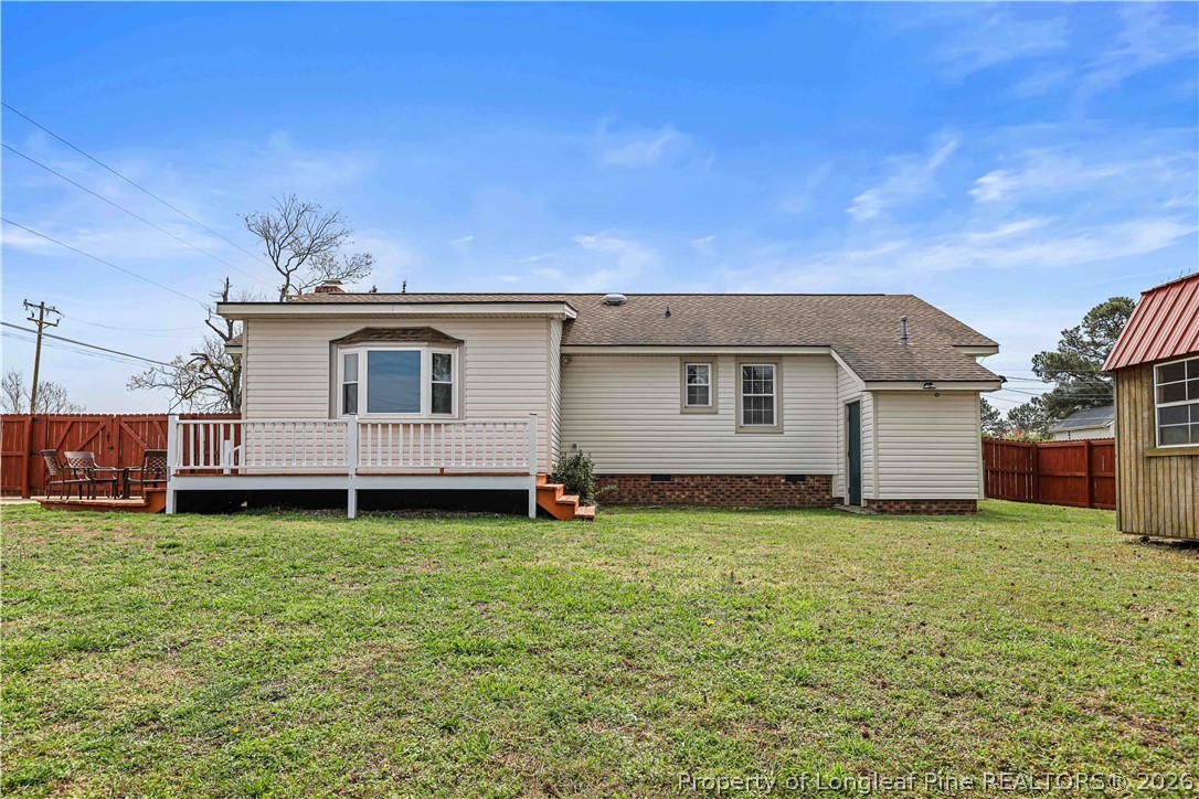 205 Violet Road Dunn, NC 28334 - Photo 28 of 31 a view of a house with a yard