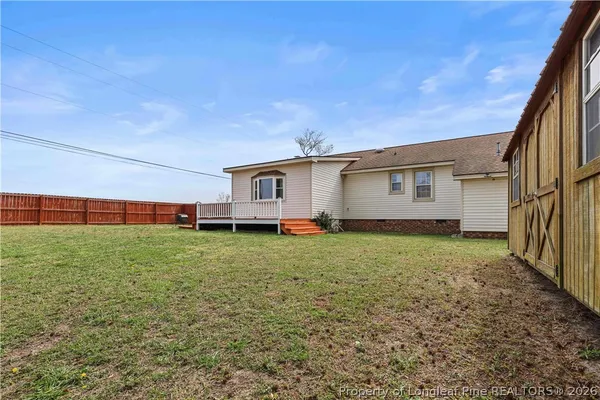 a view of a backyard with a garden