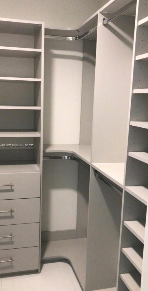 851 Northeast 1st Avenue, Unit 1108 Miami, FL 33132 - Photo 23 of 42 a view of walk in closet