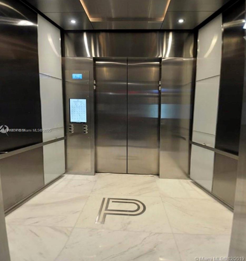 851 Northeast 1st Avenue, Unit 1108 Miami, FL 33132 - Photo 25 of 42 a bathroom with a shower