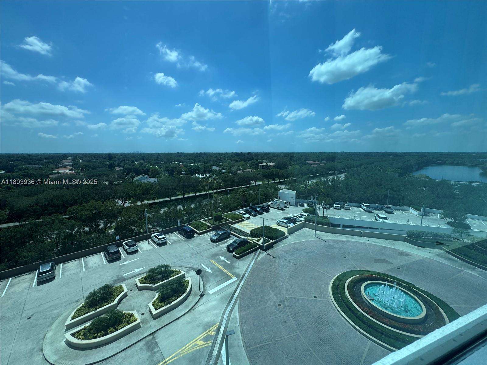 2641 North Flamingo Road, Unit 1001N Sunrise, FL 33323 - Photo 47 of 84 a view of a backyard with table and chairs