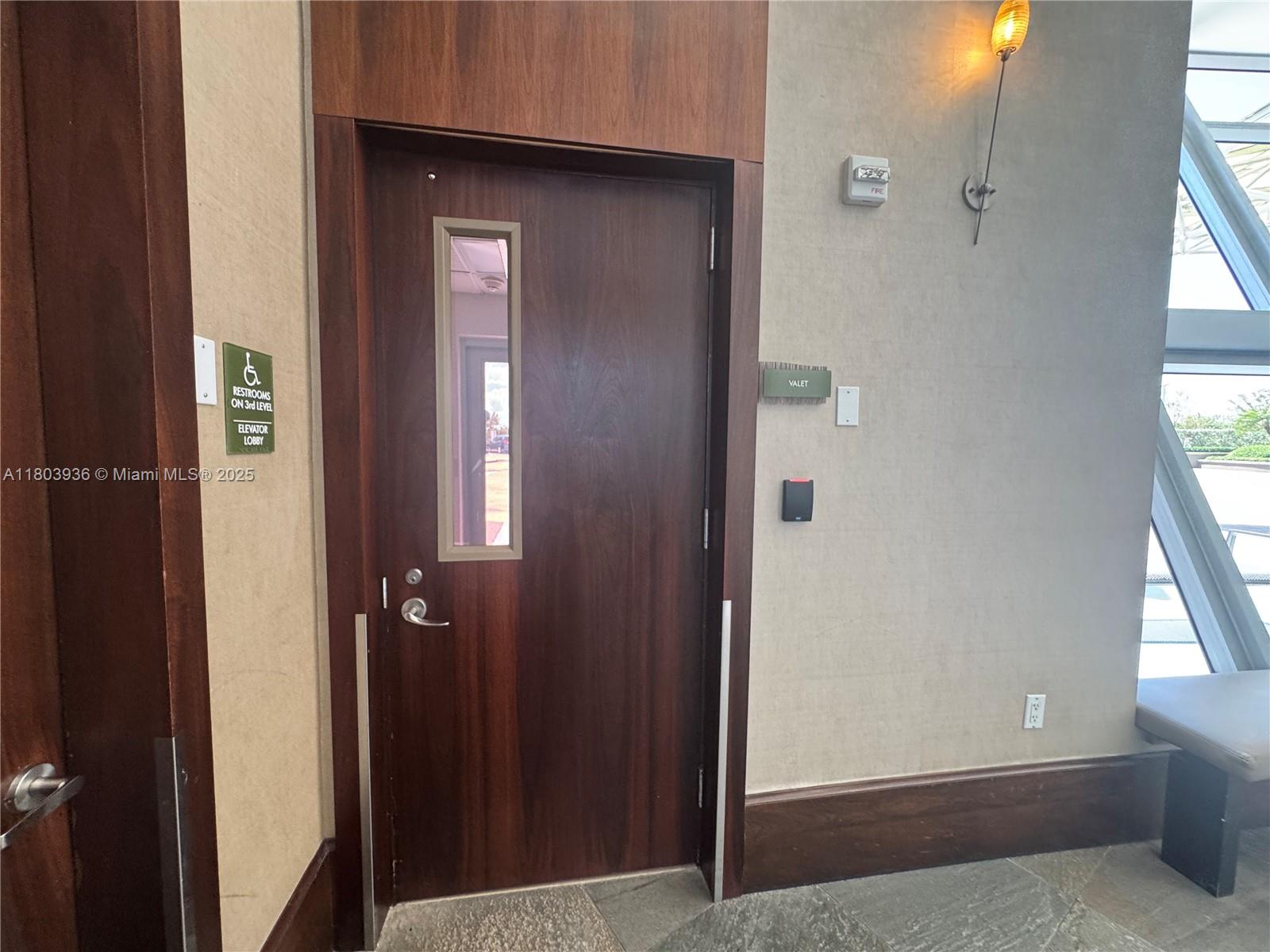 2641 North Flamingo Road, Unit 1001N Sunrise, FL 33323 - Photo 7 of 84 a view of a hallway with wooden floor and closet