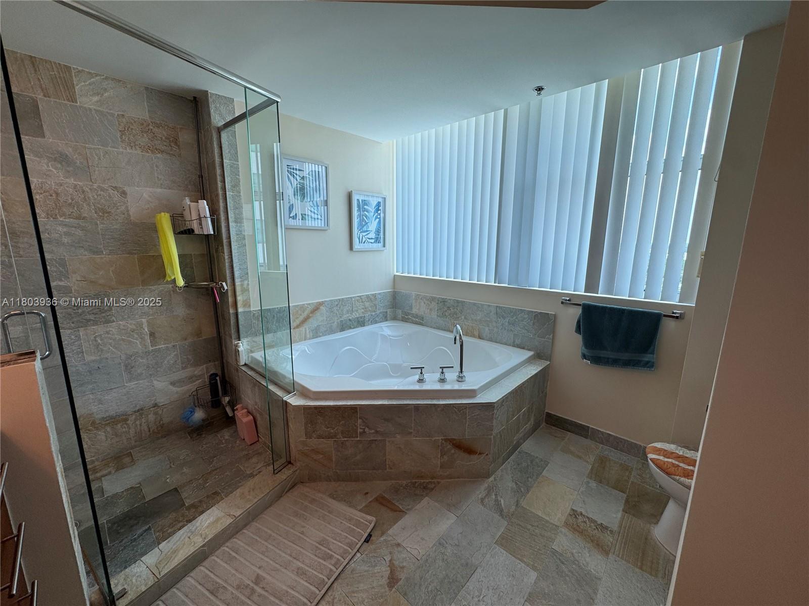 2641 North Flamingo Road, Unit 1001N Sunrise, FL 33323 - Photo 72 of 84 a bathroom with a sink toilet and shower