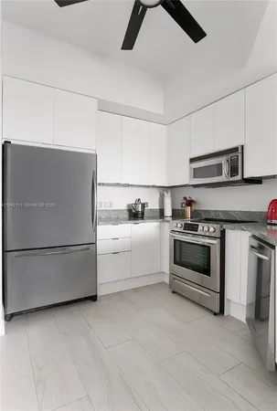 a utility room with washer and dryer