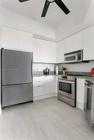 a utility room with washer and dryer