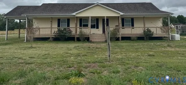 a house view with a garden space