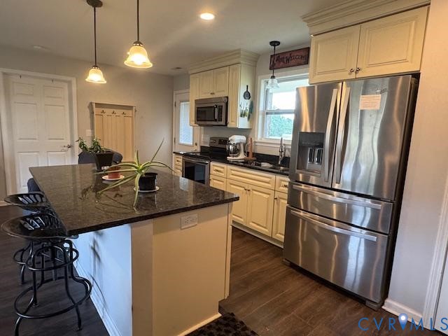 19886 River Road Courtland, VA 23837 - Photo 5 of 29 a kitchen with kitchen island a counter space a sink a stove and refrigerator