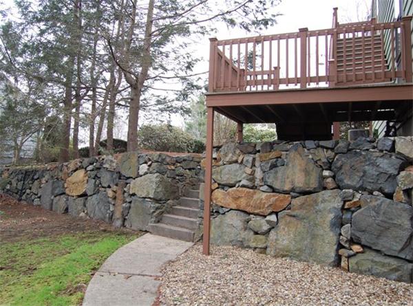 4 Dudley Road Lexington, MA 02421 - Photo 23 of 26 a view of a balcony with an outdoor seating