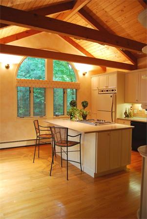 4 Dudley Road Lexington, MA 02421 - Photo 6 of 26 a view of a kitchen with kitchen island and a large window