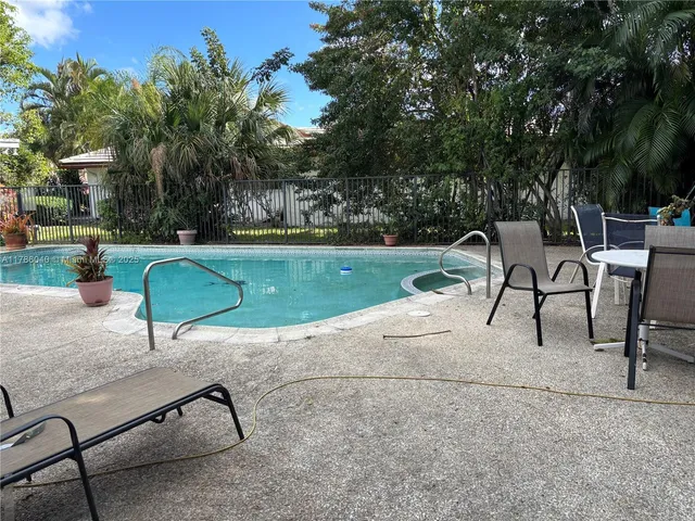 a view of a backyard with a patio