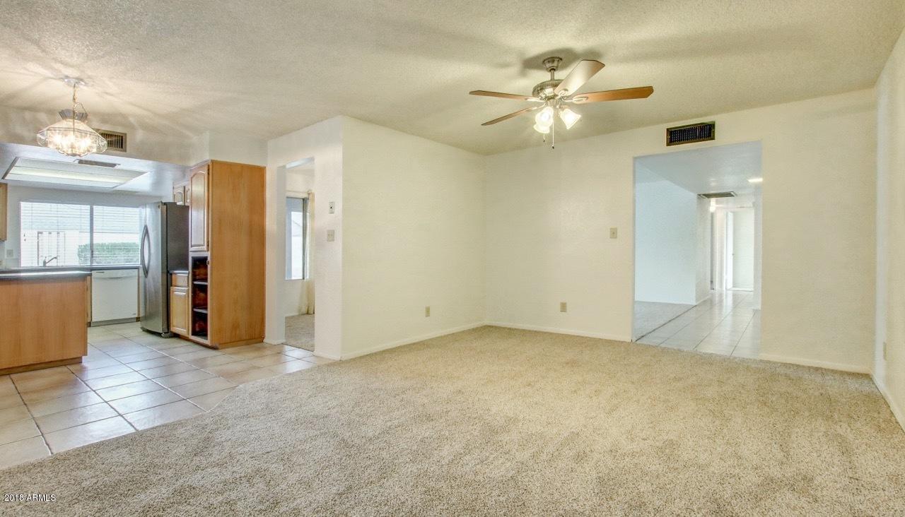 3946 West Hearn Road Phoenix, AZ 85053 - Photo 6 of 21 FAMILY RM TOWARD KITCHEN