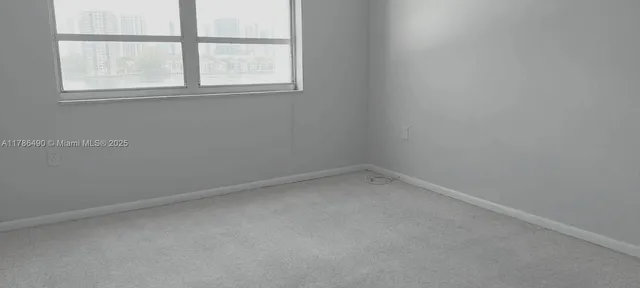 an empty room with a window