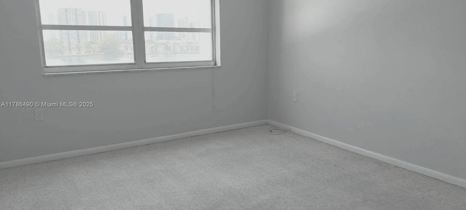 2750 Northeast 183rd Street, Unit 511 Aventura, FL 33160 - Photo 16 of 36 a room that has a window