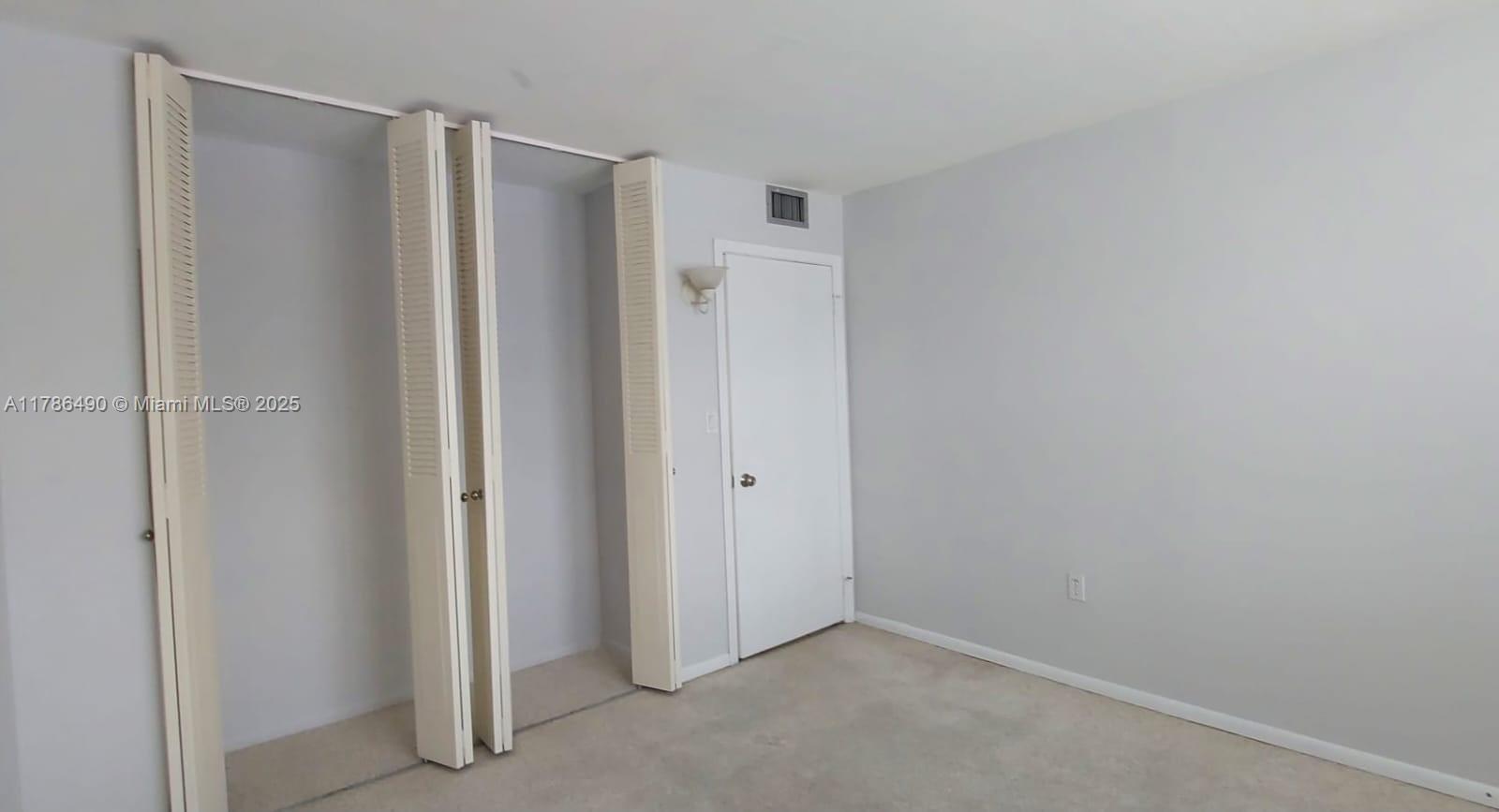 2750 Northeast 183rd Street, Unit 511 Aventura, FL 33160 - Photo 19 of 36 a view of closet area