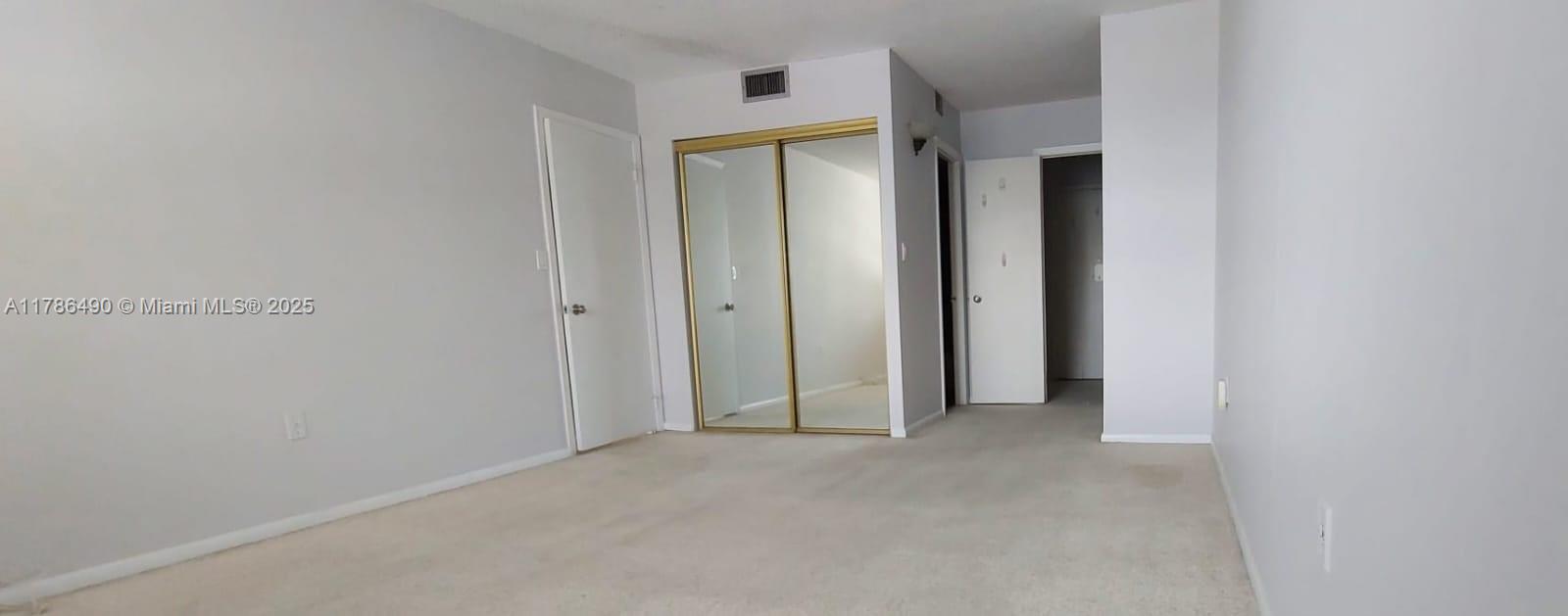 2750 Northeast 183rd Street, Unit 511 Aventura, FL 33160 - Photo 20 of 36 a view of a room with drop ceiling