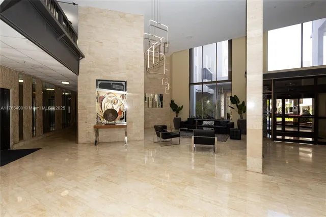 a view of living room with furniture and window