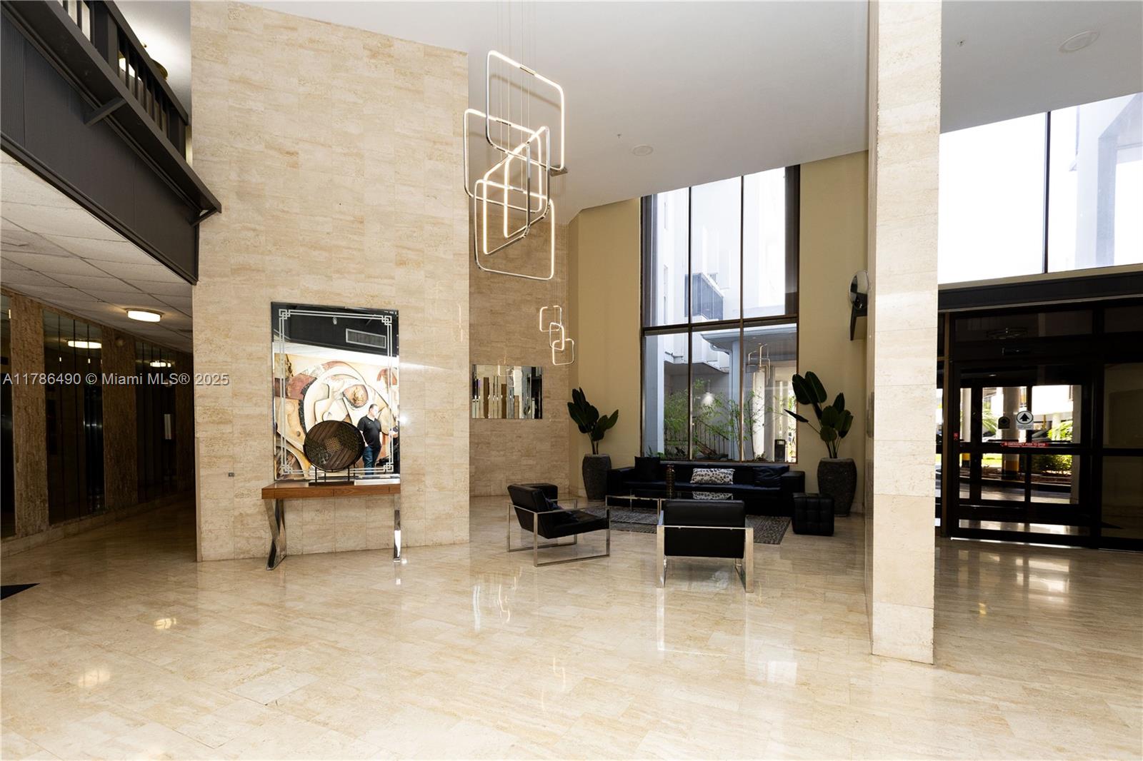 2750 Northeast 183rd Street, Unit 511 Aventura, FL 33160 - Photo 34 of 36 a view of a livingroom with furniture and windows