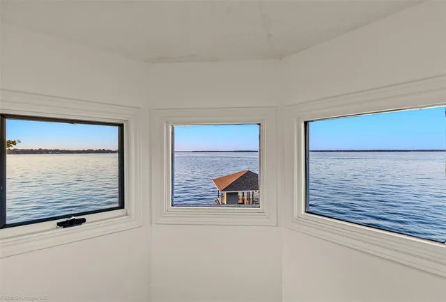 a view of front door and wooden floor