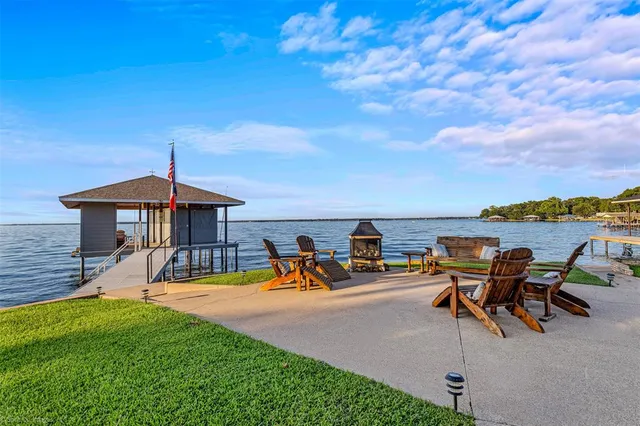 an outdoor space with furniture and umbrella