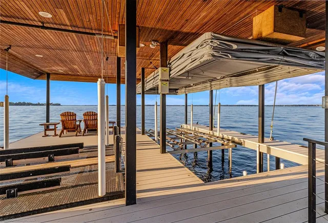 a view of a balcony with chairs
