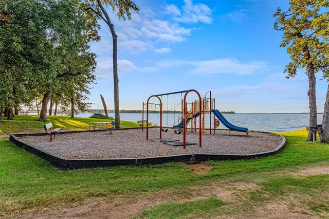 a view of swimming pool with outdoor seating