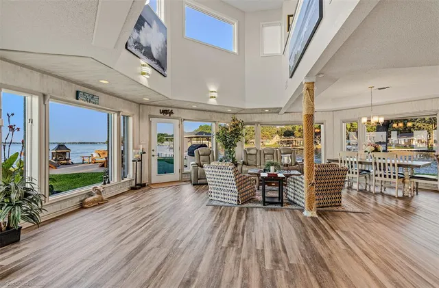 a view of a living room and a wooden floor