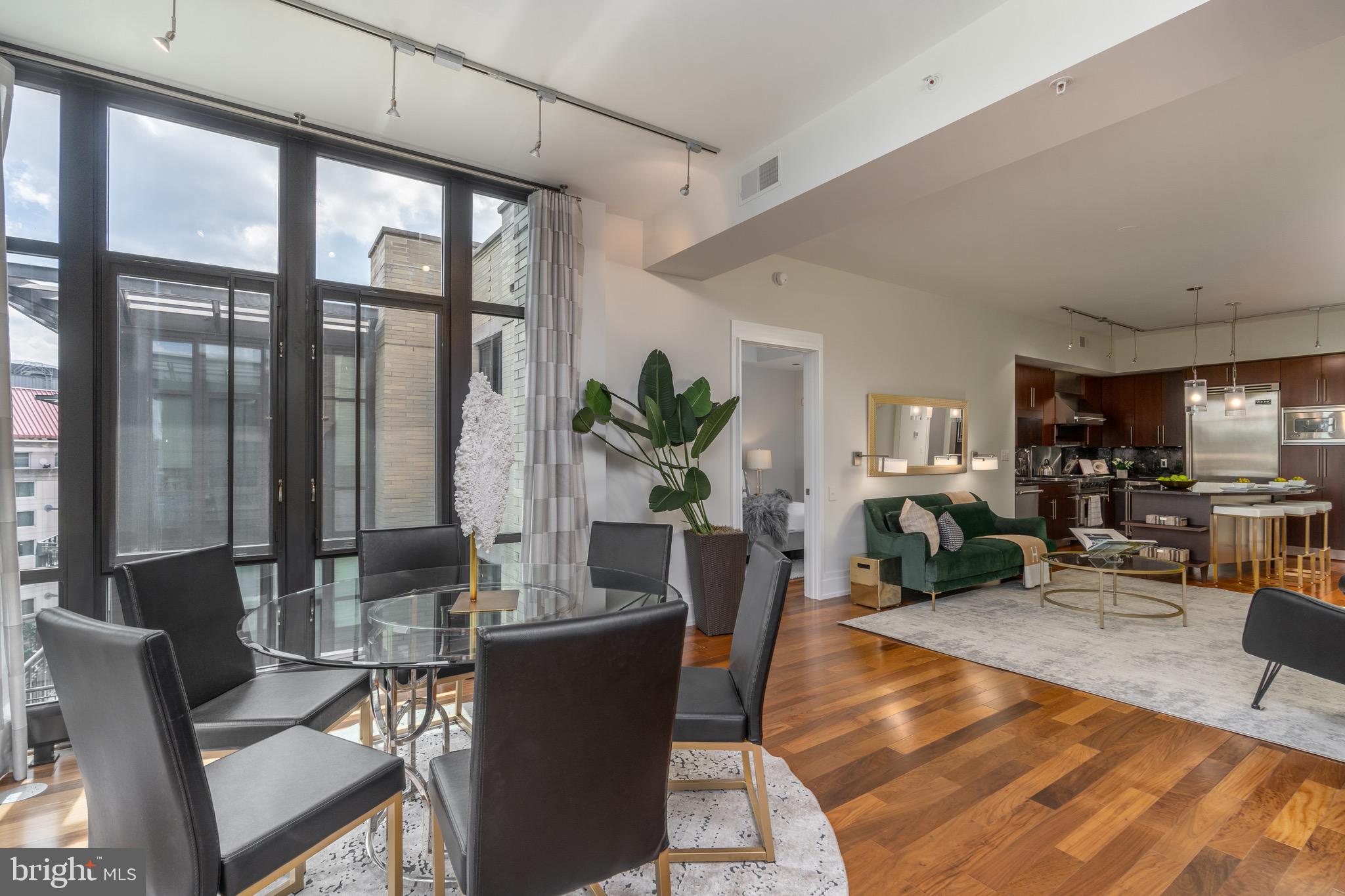 4301 Military Road Northwest, Unit PH9 Washington, DC 20015 - Photo 17 of 48 Dining room open to sitting area
