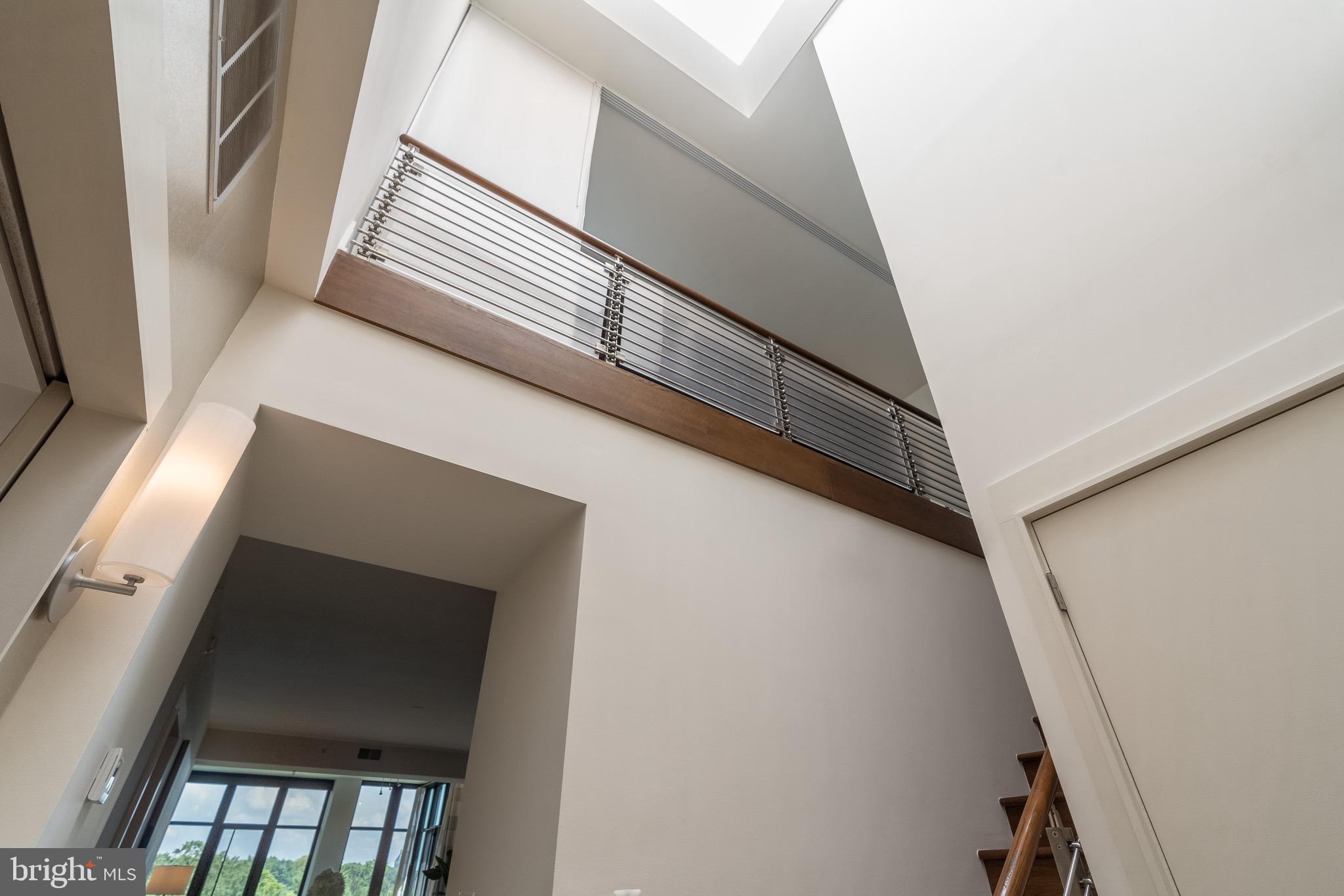 4301 Military Road Northwest, Unit PH9 Washington, DC 20015 - Photo 28 of 48 Foyer open to above