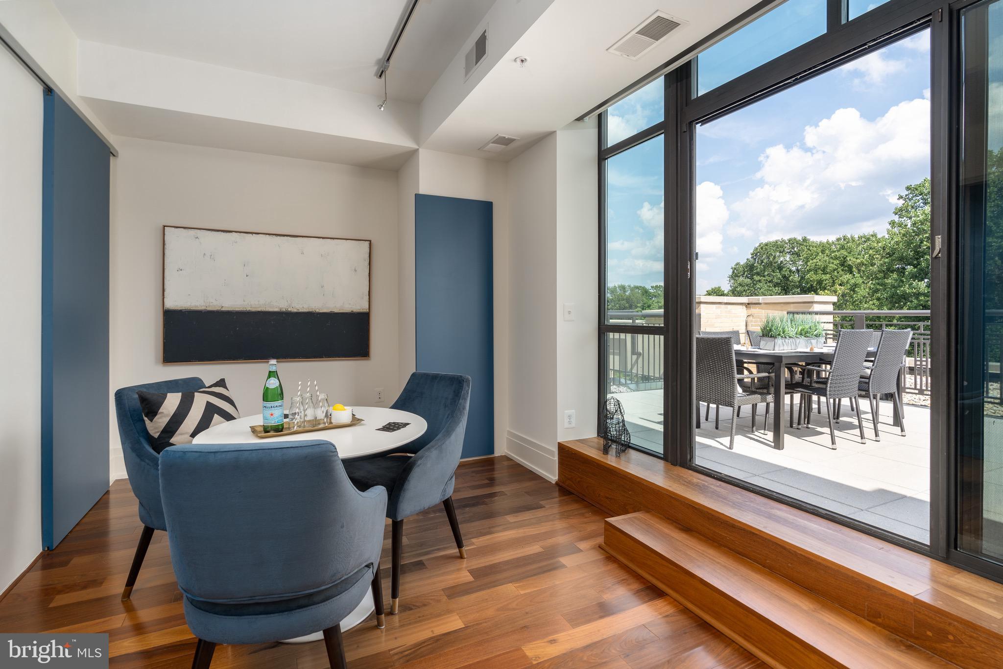 4301 Military Road Northwest, Unit PH9 Washington, DC 20015 - Photo 35 of 48 Family room with access to rooftop terrace