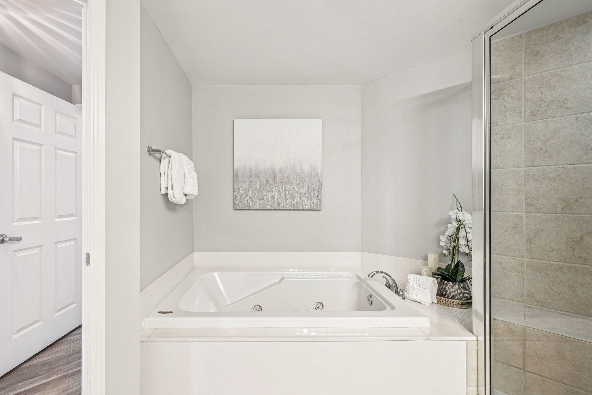 1048 Highway 98, Unit 106W Destin, FL 32541 - Photo 16 of 37 a bathroom with a tub