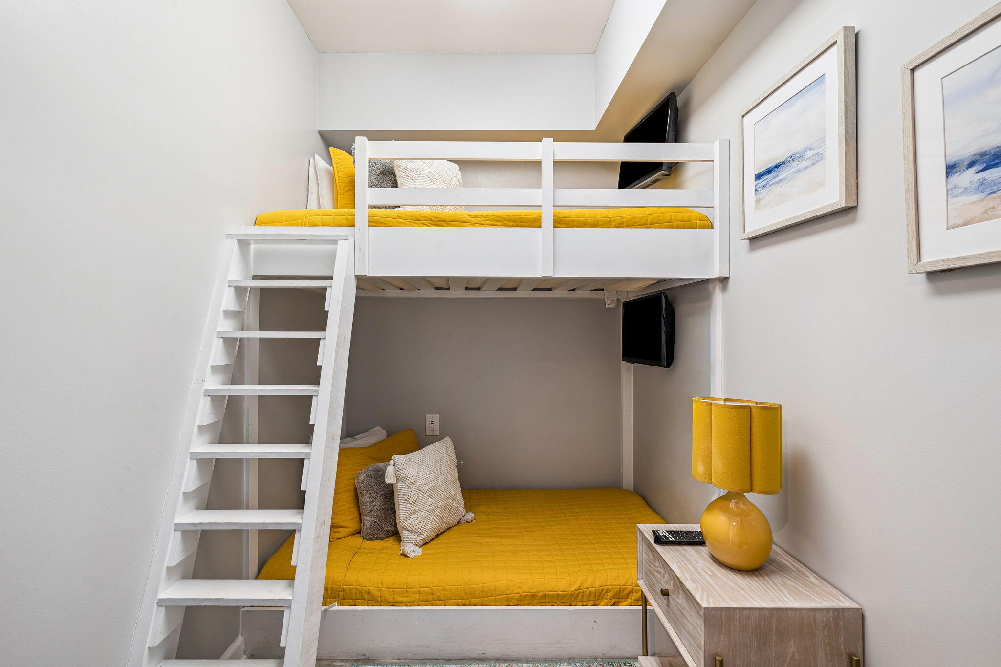 1048 Highway 98, Unit 106W Destin, FL 32541 - Photo 17 of 37 a bedroom with a bed and teddy bear on the wall