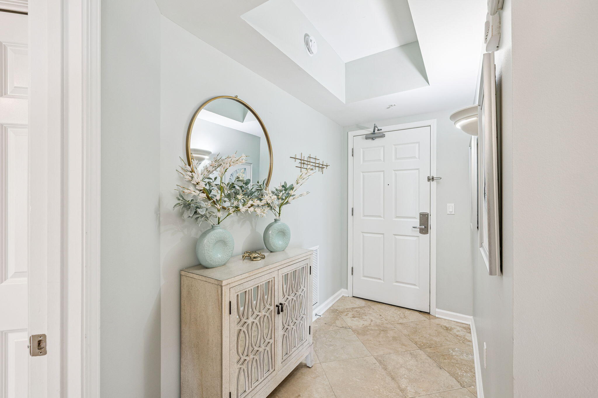 1048 Highway 98, Unit 106W Destin, FL 32541 - Photo 6 of 37 a view of a hallway with entryway