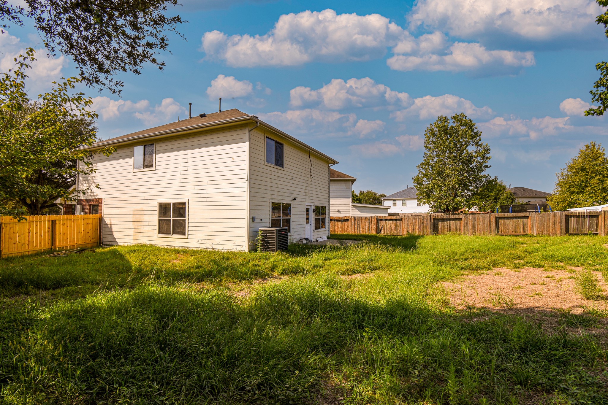 19362 Moss Meadow Lane Katy, TX 77449 - Photo 35 of 35 a view of backyard of house and trees in the background