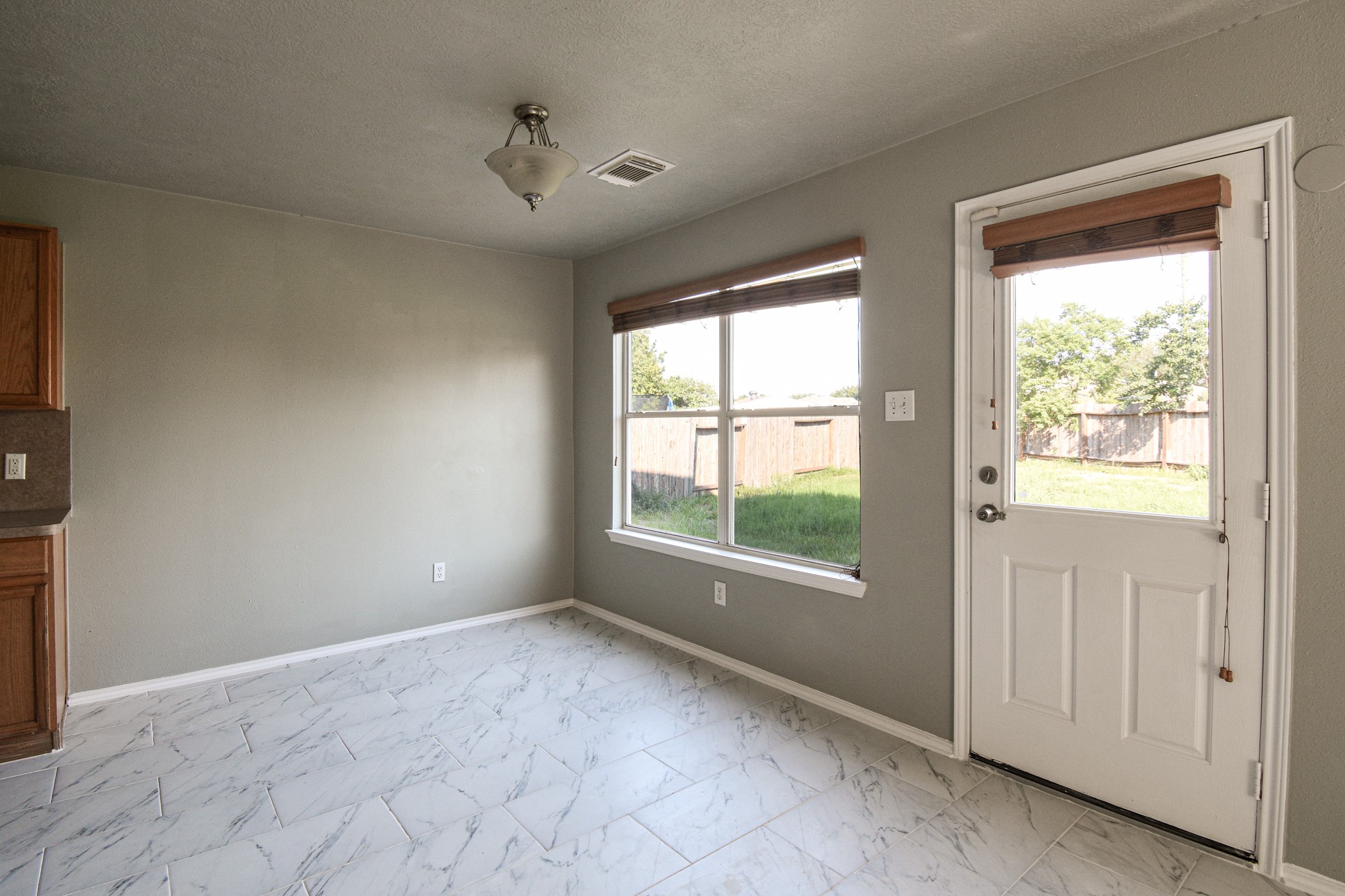 19362 Moss Meadow Lane Katy, TX 77449 - Photo 9 of 35 a view of an empty room with a window