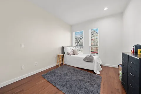 a room with furniture and a wooden floor