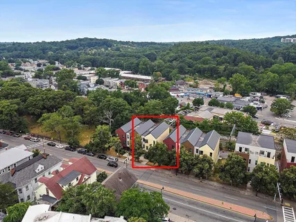 a aerial view of multi story residential apartment building