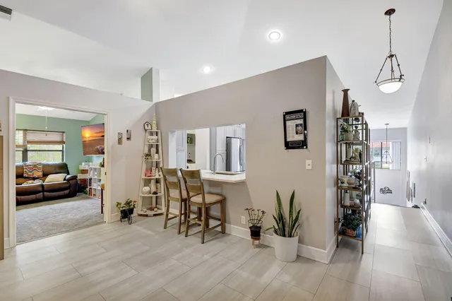 a view of a balcony with furniture