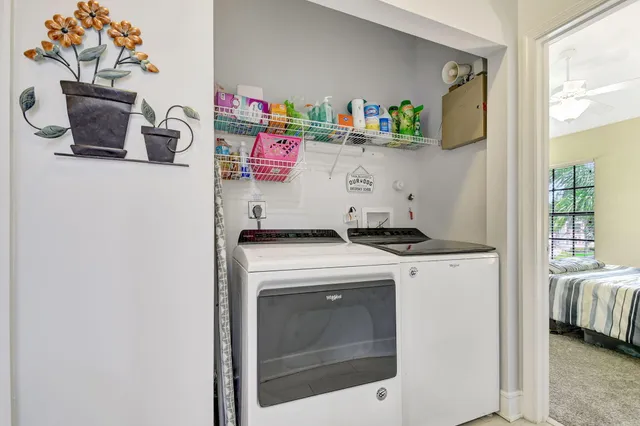 a view of a backyard with sitting area