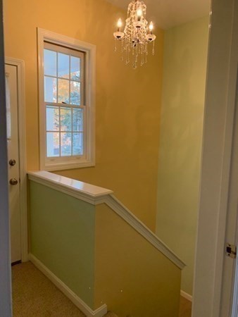 110 Maple Place, Unit 7 Dedham, MA 02026 - Photo 12 of 17 a view of a room with window