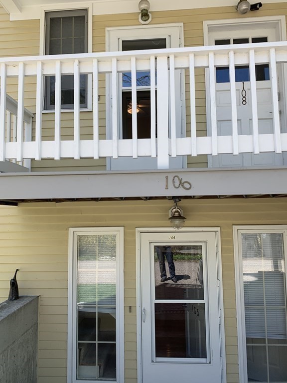 110 Maple Place, Unit 7 Dedham, MA 02026 - Photo 3 of 17 a front view of a house with a window