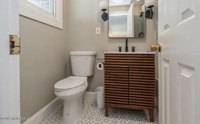 a bathroom with a sink and a toilet