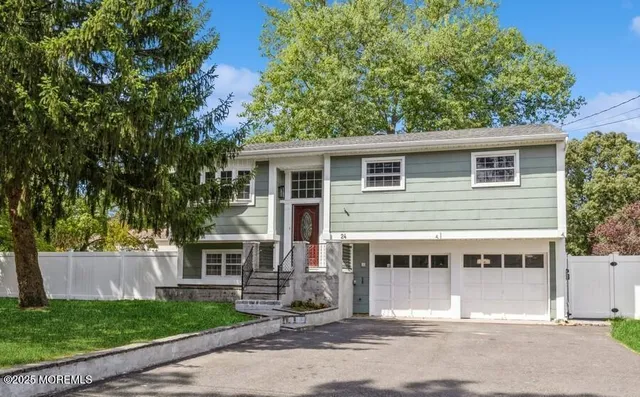 a house view with a garden space
