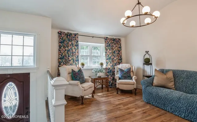 a living room with furniture or couch and a window