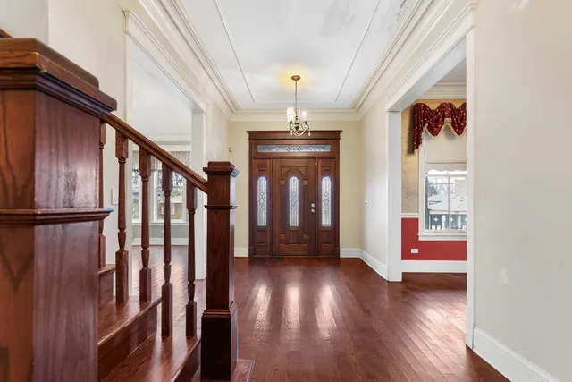 a view of livingroom with furniture window and wooden floor