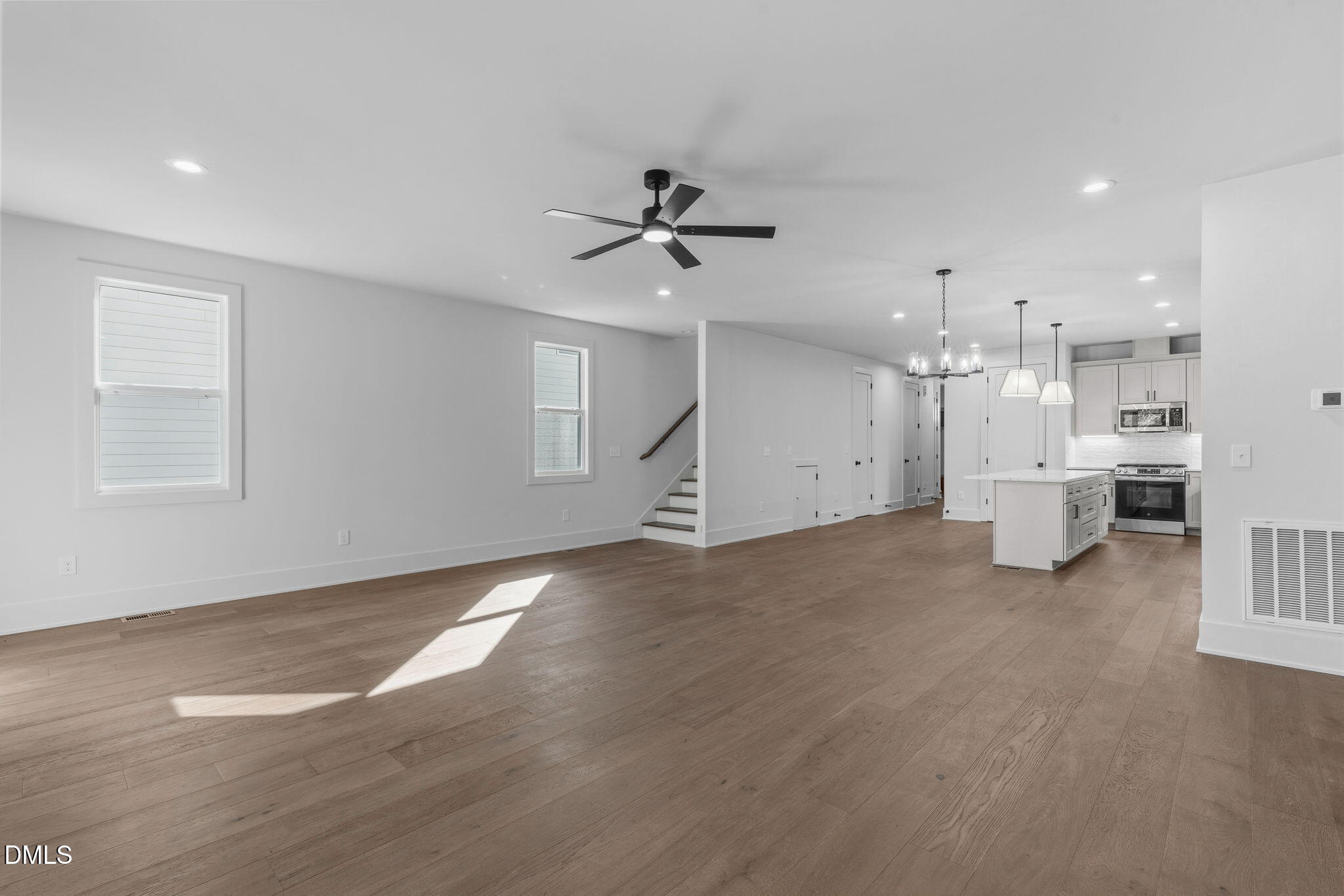 635 Conover Road, Unit B Durham, NC 27703 - Photo 22 of 48 a view of a kitchen with a sink and cabinets