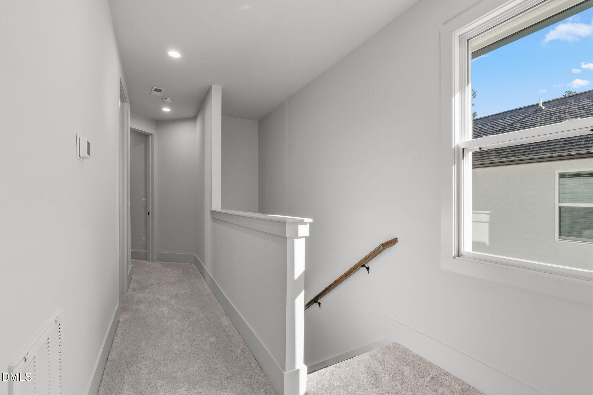 635 Conover Road, Unit B Durham, NC 27703 - Photo 23 of 48 a view of a hallway with windows