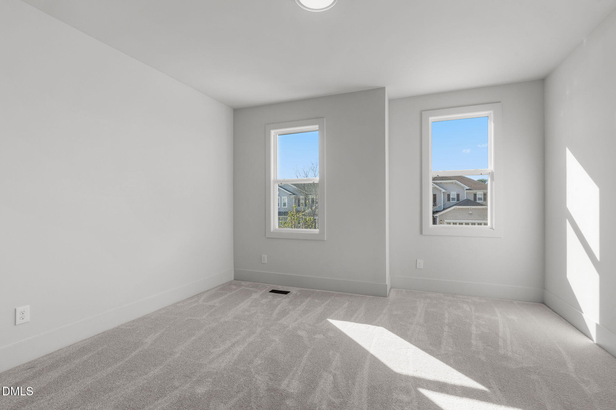 635 Conover Road, Unit B Durham, NC 27703 - Photo 35 of 48 an empty room with windows