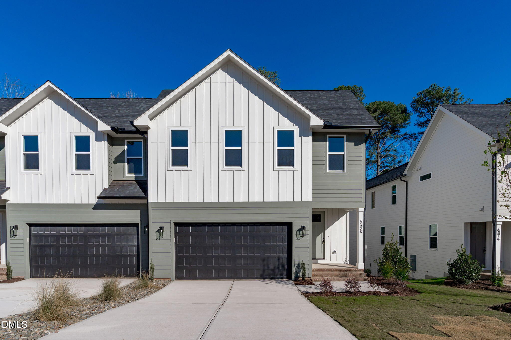 635 Conover Road, Unit B Durham, NC 27703 - Photo 5 of 48 a front view of a house with garden