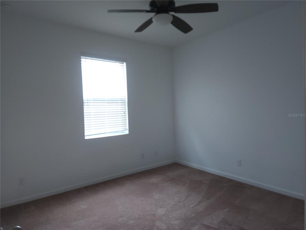 3230 Stratton Circle Kissimmee, FL 34744 - Photo 21 of 28 an empty room with a window